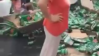 People Stack Up On Beer After A Truck Crash Dumps Out All The Products!