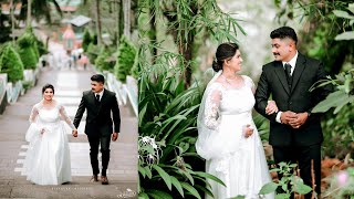 Kerala Christian Wedding Highlights  / Olakkuda Weddings / Akhil Anjana