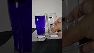 diy science experiment showing blue water fountain #fountain #diy #scienceexperiment