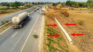 Cleaning a 15-metre-long sewer system for construction using two mini-dozers and truck processing