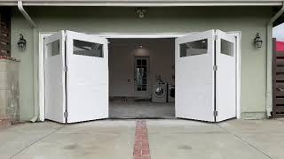 Automatic bifold garage door