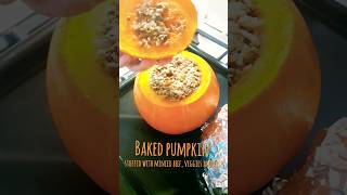 Baked pumpkin stuffed with minced beef, veggies and rice