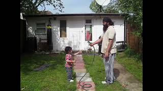 Imaan Singh with the water hose - April 2009