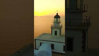 AKROTIRI LIGHTHOUSE SUNSET - SANTORINI. Greece