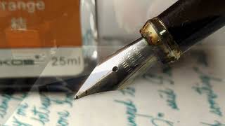 Unknown China Pen (Blue Cloud) F nib. Karkos Orange. Cursive Writing fountain pen. BG music.