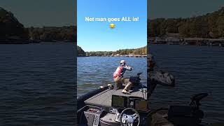 Net man goes ALL in to get this fish in the boat!