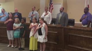 Mrs. Spillane and Rising Leaders Singing National Anthem at Lynn Haven Commission Meeting