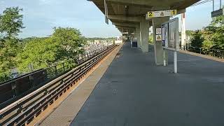 LIRR train with M9s blasting through Bellmore Station with a nice horn salute.