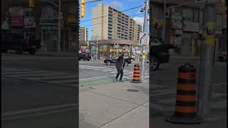 №648_Y.Z.A cheerful man crosses the street on a red light.