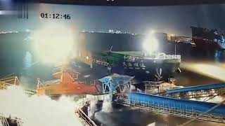 Cargo ship crashes into port and sank crane in Shanghai