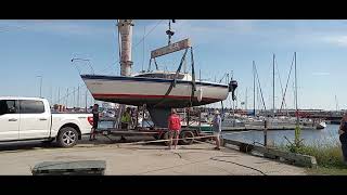 How to use a Crane get your Sailboat onto the Trailer. Human Power.