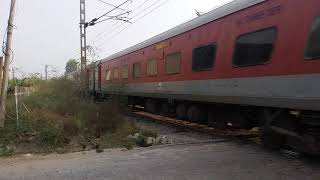 WAP7 hauled 22461 Shrishakti Express rips LC gate at MPS