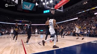 Jamal Murray throws a heat pack on the court in frustration