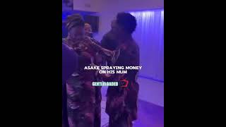 Asake Spraying money on his mum. Asake has been one of most of successful Nigeria artist. #asake