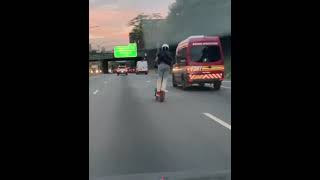 scooter on the highway going 60mph