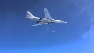 Fighters SU-30SM escorted the strategic missile carrier TU-160  that fired cruise missiles on ISIS