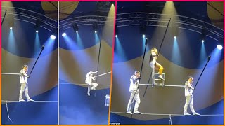 A circus performer was rushed to hospital after falling from a tightrope in front of a horrified