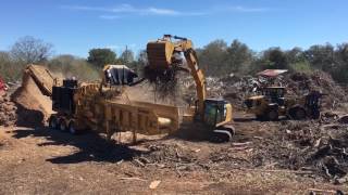 HG6000 on land clearing debris and chunk hardwood