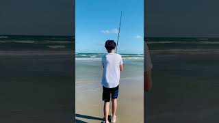 Surf. Fishing at Mustang Island, red