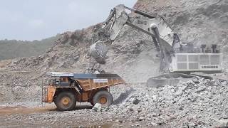 Liebherr 996 Excavator and cat komatsu 885  loading dumper