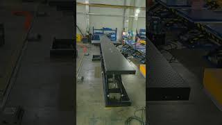 Super long scissor lift table with a big built-out pump station