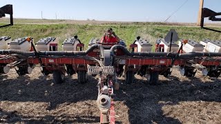 Iowa corn planting. White planter with AgLeader.