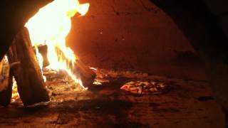 Wood Fired Cob Bread Oven Cooking Pizza