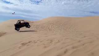 Victoria jumping her RZR XP1K up Patton hill.