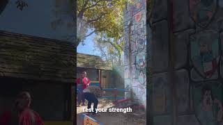 Lumberjack tests his strength