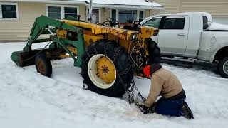 Installing tire chains on my Minneapolis Moline Jetstar 3 tractor