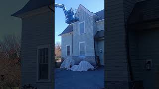 Painting a house using a Genie 45' articulating lift #genielift  @a1roofingandconstructionco523