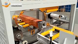 Horizontal orbital stretch film wrapping machine