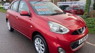 Nissan Micra red AJ65BZK