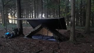 Woodland camp in the rain with the Dutch Army tent