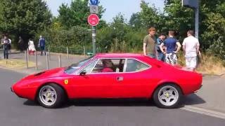 Red Ferrari Dino 308 GT4 leaving Cars and Coffee Düsseldorf