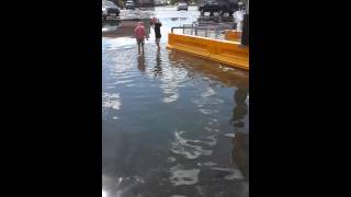 Boys play in the rain water 2