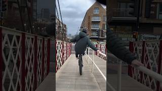 Smooth wheelie over a bridge 🌉 #shorts #youtube #viral #bikelife #wheelie #insane #goviral