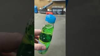 How to open Japan Soda called Ramune Drink.  Why the funny bottle?