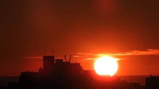 Sunrise behind the buildings