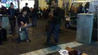 street musician bad cover of Pixies song Where Is My Mind