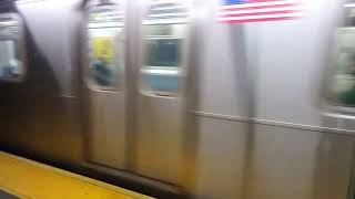 7 train hauling ass into Queensboro plaza at night