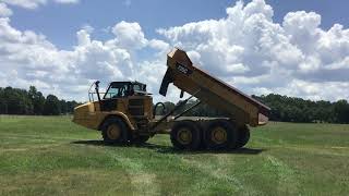 CATERPILLAR 725C DUMP TRUCK