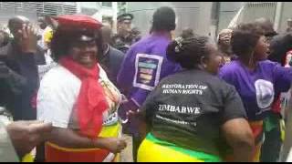 Zim protesters block Chinamasa's taxi in London Part 2