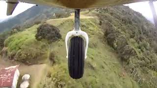 de Havilland Canada DHC-6 Twin Otter landing on a mountain