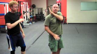 Forearm/Hammerfist Strike: #5 - Turn to Rear Downward Strike