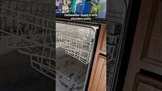 Removing old dishwasher that's glued in with plumbers putty. #appliances #dishwasher #shorts