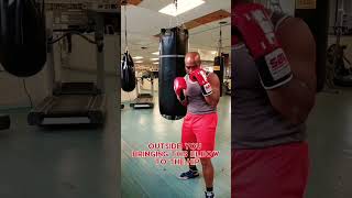 Level Up Your Boxing Skills: Master the Body Shot Block #boxingcoach #boxingtraining #ytshorts