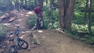 HIDDEN DIRT RAMPS IN A FOREST!! - DAY 48