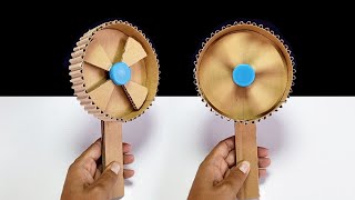 How to make a Mini fan out of cardboard and rubber bands | พัดลมมือถือหมุนจากหนังยาง