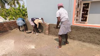 Plastering construction with cement mixture on roof hand wall